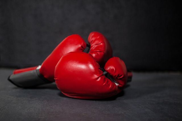 Close-up of boxing gloves in fitness studio