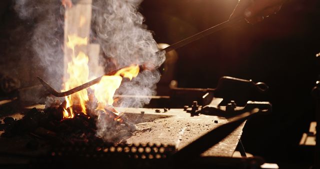 Close-up of Hands Crafting Metal near Blazing Forge Fire - Download Free Stock Images Pikwizard.com