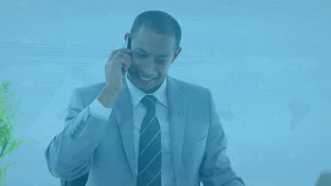 Businessman talking on phone with digital overlay