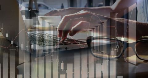 Businesswoman Typing on Laptop with Data Analytics Overlay