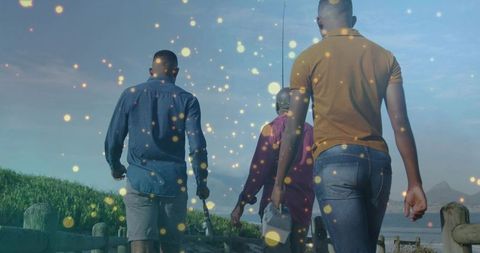 Father and sons walking on seaside adventure with fishing gear