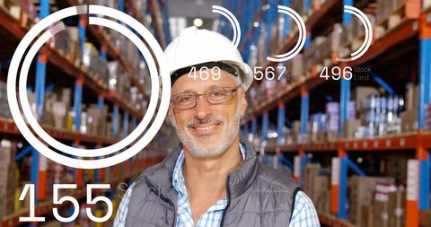 Warehouse worker analyzing stock data in digital interface