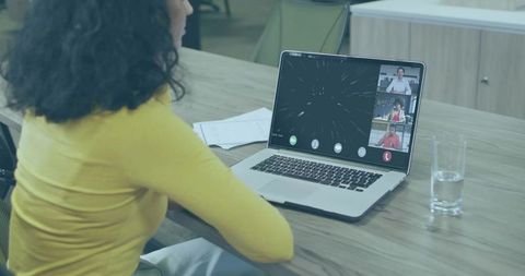 Professional Hispanic Woman in Virtual Meeting