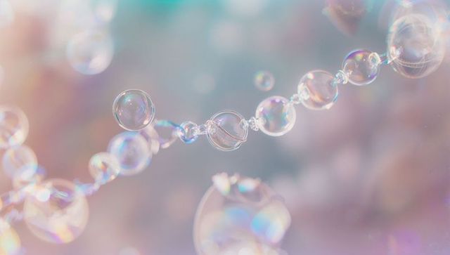 Translucent Soap Bubbles Across Dreamy Pastel Backdrop