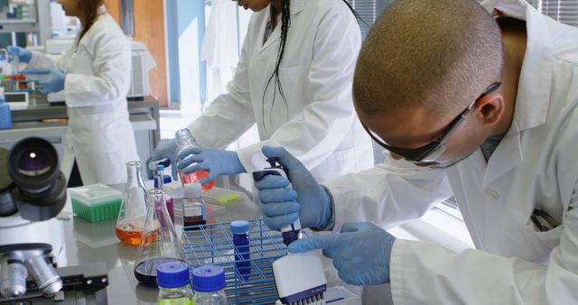 Scientist Researchers working in Laboratory with Chemical Samples - Download Free Stock Images Pikwizard.com