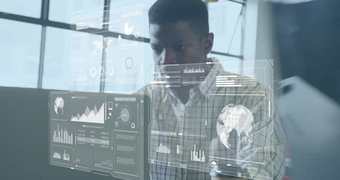 Young Professional Analyzing Data on Digital Interface