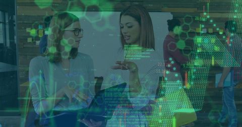 Businesspeople collaborating amidst financial data overlays