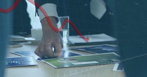 Businessman Analyzing Financial Charts with Red Line Graph - Download Free Stock Images Pikwizard.com