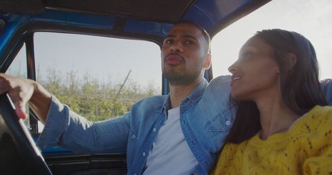 Couple Enjoying Scenic Road Trip in Sunlit Countryside - Download Free Stock Images Pikwizard.com