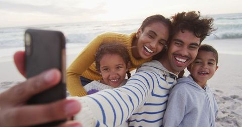 Happy Family Taking Selfie at Beach During Vacation - Download Free Stock Images Pikwizard.com