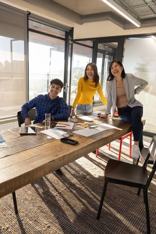 Diverse Creative Professionals Collaborating in Modern Office