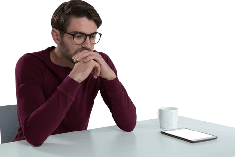 transparent man sitting thoughtfully at desk in profile view - Download Free Stock Videos Pikwizard.com