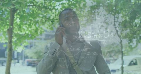 Business Executive Conversing Amidst Urban Greenery with Mathematical Elements