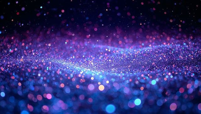 Shimmering iridescent glitter field creating dreamlike bokeh waves in purple blue tones