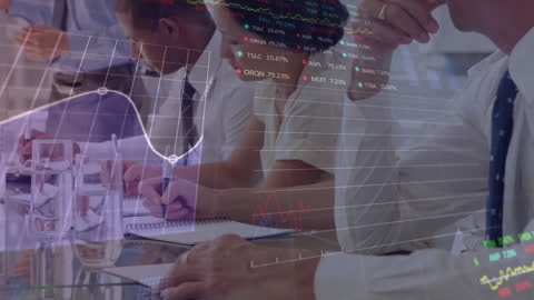 Diverse Team Analyzing Stock Market Data in Conference Room