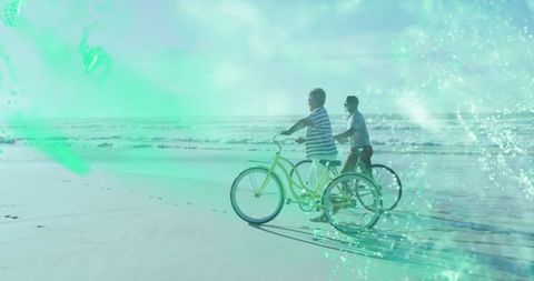 Mother and Son Cycling Along Beach Shoreline in Tranquil Setting
