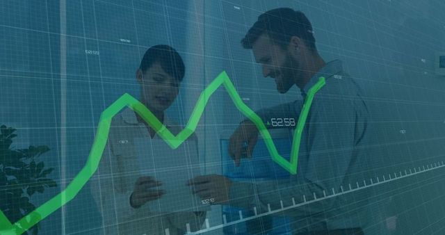 Colleagues Analyzing Data on Digital Chart in Office