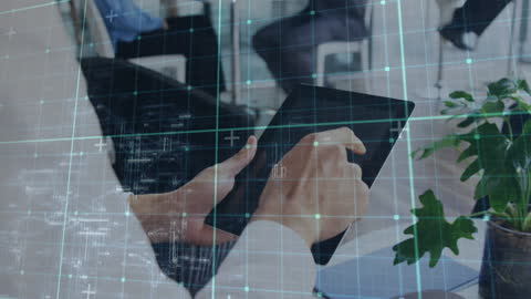 Businessman Interacting with Digital Data Overlay Using Tablet