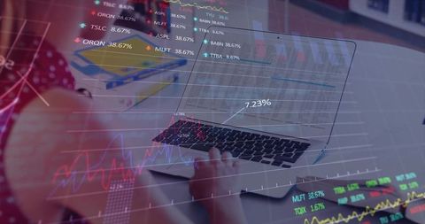 Teen analyzing stock market data on laptop