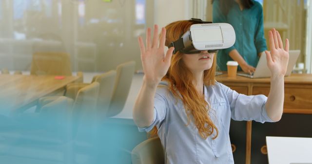 Woman Engaged in Virtual Reality Experience in Modern Office Space - Download Free Stock Images Pikwizard.com