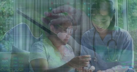 Nurse Assists Senior with Medication Dosage at Home