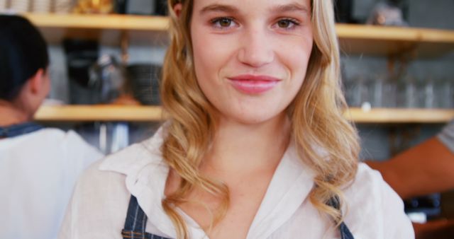 Smiling Barista in Local Coffee Shop Wearing Apron Looking at Camera - Download Free Stock Images Pikwizard.com