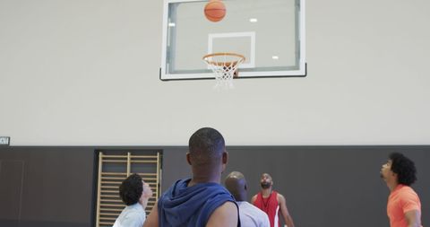 Diverse Basketball Team Training Indoor with Coach - Download Free Stock Images Pikwizard.com