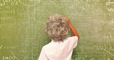 Young Student Writing Mathematics on Guinea - Download Free Stock Images Pikwizard.com