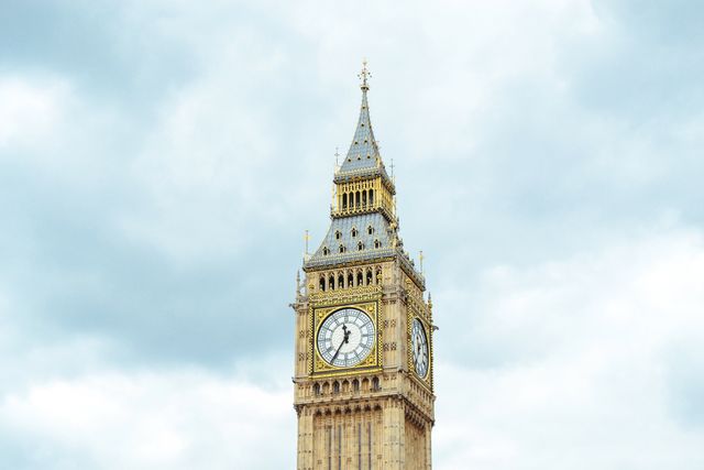 Big Ben Clock Tower with a Cloudy Sky in London - Download Free Stock Photos Pikwizard.com