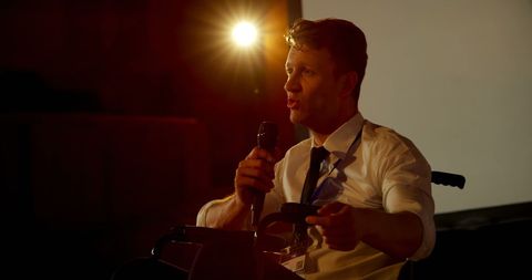 Disabled Businessman Giving Inspiring Seminar Presentation