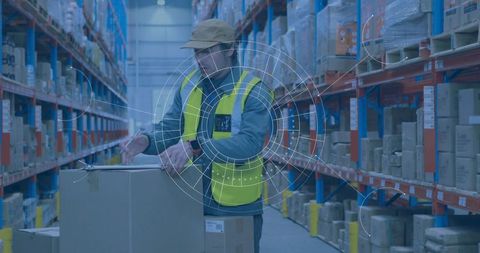 Focused warehouse worker in high-tech logistics setting