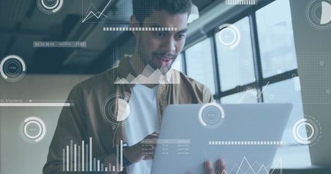 Tech Professional Analyzing Data with Transparent Overlays in Modern Office