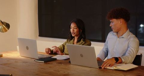 Late night collaboration meeting at office