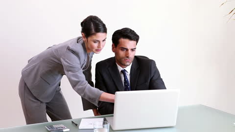 Business Professional Team Collaborating on Digital Project