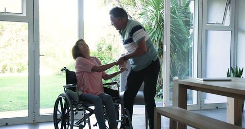 Caring Senior Couple Spending Time Together in Cozy Home