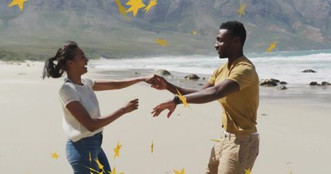 Playful Couple Dancing on Beautiful Beach with Scenic Views