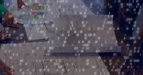 Architectural team collaborating on blueprints and color palette with binary data overlay