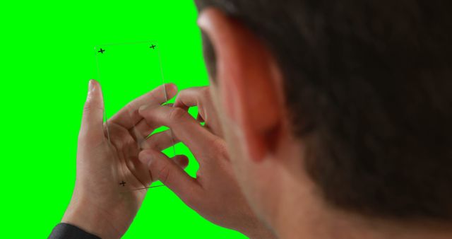 Man Interacting with Transparent Touchscreen Device, Green Screen Background - Download Free Stock Images Pikwizard.com