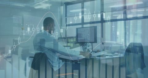 Analyzing financial data: businessman surrounded by digital information