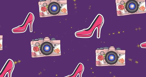 Pink high heels and cameras on vibrant purple backdrop