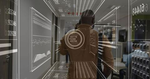 Professional Discussing in Tech Office Corridor with Digital Interfaces