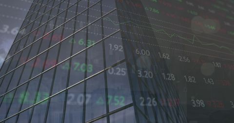 Stock market data overlay on modern skyscraper
