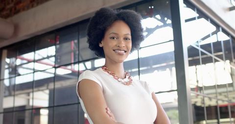 Confident Female African American Entrepreneur Smiling Indoors