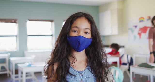 Schoolgirl Wearing Mask in Classroom During Pandemic - Download Free Stock Images Pikwizard.com