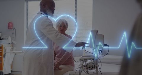 Doctor with patient discussing heart health technology overlay