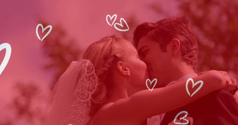 Newlywed Couple Kissing in Romantic Wedding Moment