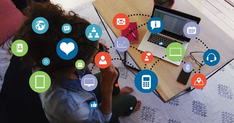 Woman Engaging with Digital Network Icons on Laptop - Download Free Stock Images Pikwizard.com