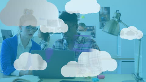 Creative Team Collaborating in Tech Office with Cloud Icons