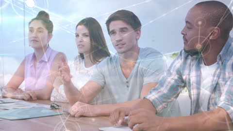 Diverse Team in Futuristic Technology Concept Meeting