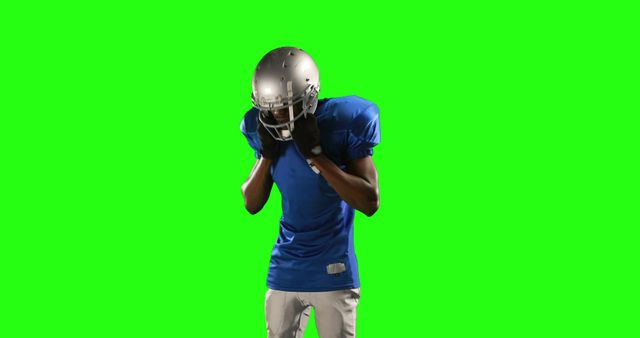 American Football Player Wearing Blue Uniform Against Green Screen - Download Free Stock Images Pikwizard.com